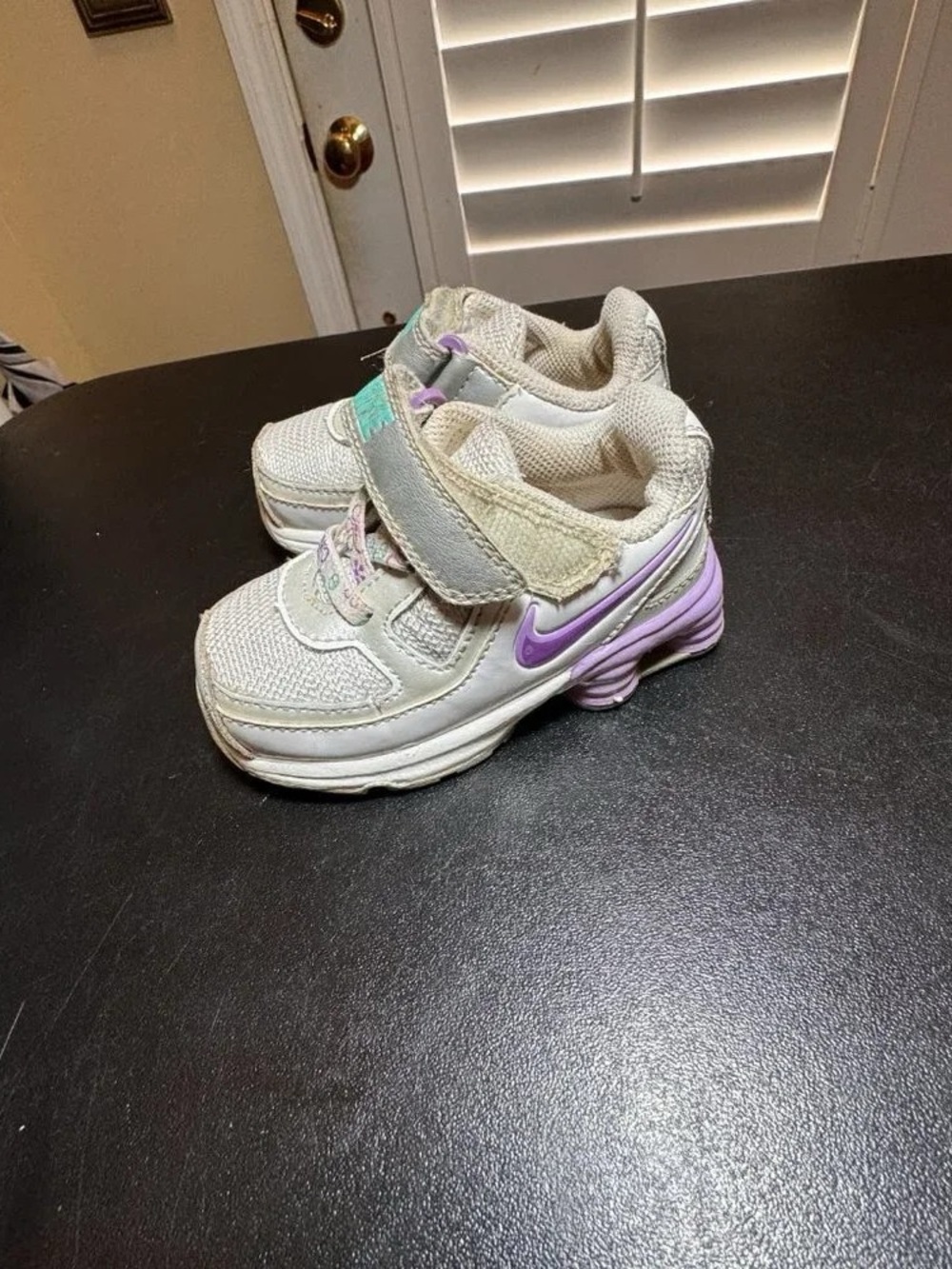 Nike Kids White Sneakers with Purple Accents
